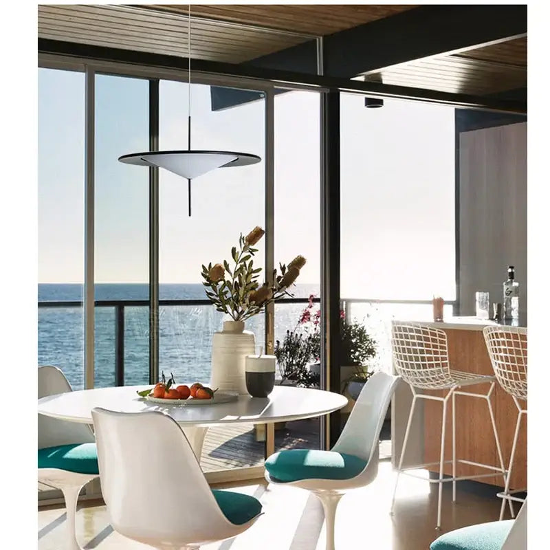 Modern black designer ufo chandelier white pendant light with sleek disc design and black trim by decorbites designer