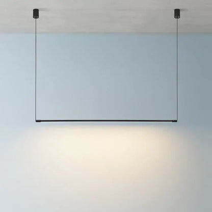 Minimalist black dimmable led pendant light with sleek linear design hanging by thin cords for dining room decorbites