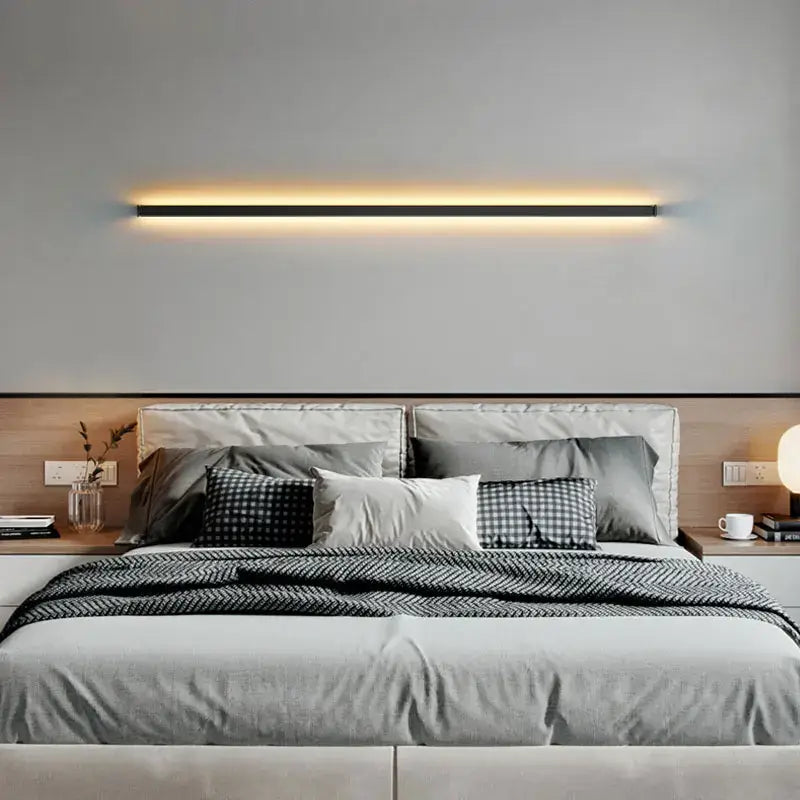 Modern black dimmable long wall lamp by decorbites emitting warm ambient glow for bedroom lighting