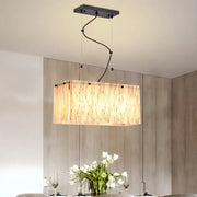 DecorBites™ modern black dining room island light fixture with rectangular amber glass shade cord length and bulb base details