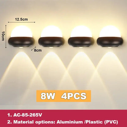 Four identical 8w led wall lights with rounded white diffusers and dark brown bases for modern outdoor use