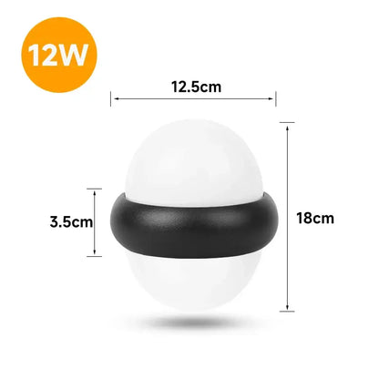 A sleek modern black dome led wall light with a white spherical body and black rubberized band for outdoor use