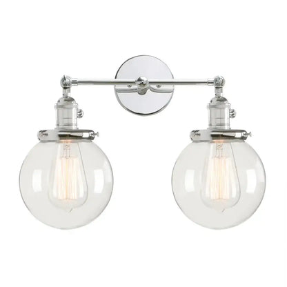 Modern black double ball heads globe glass wall sconce with chrome finish and exposed filament bulbs for bedroom lighting