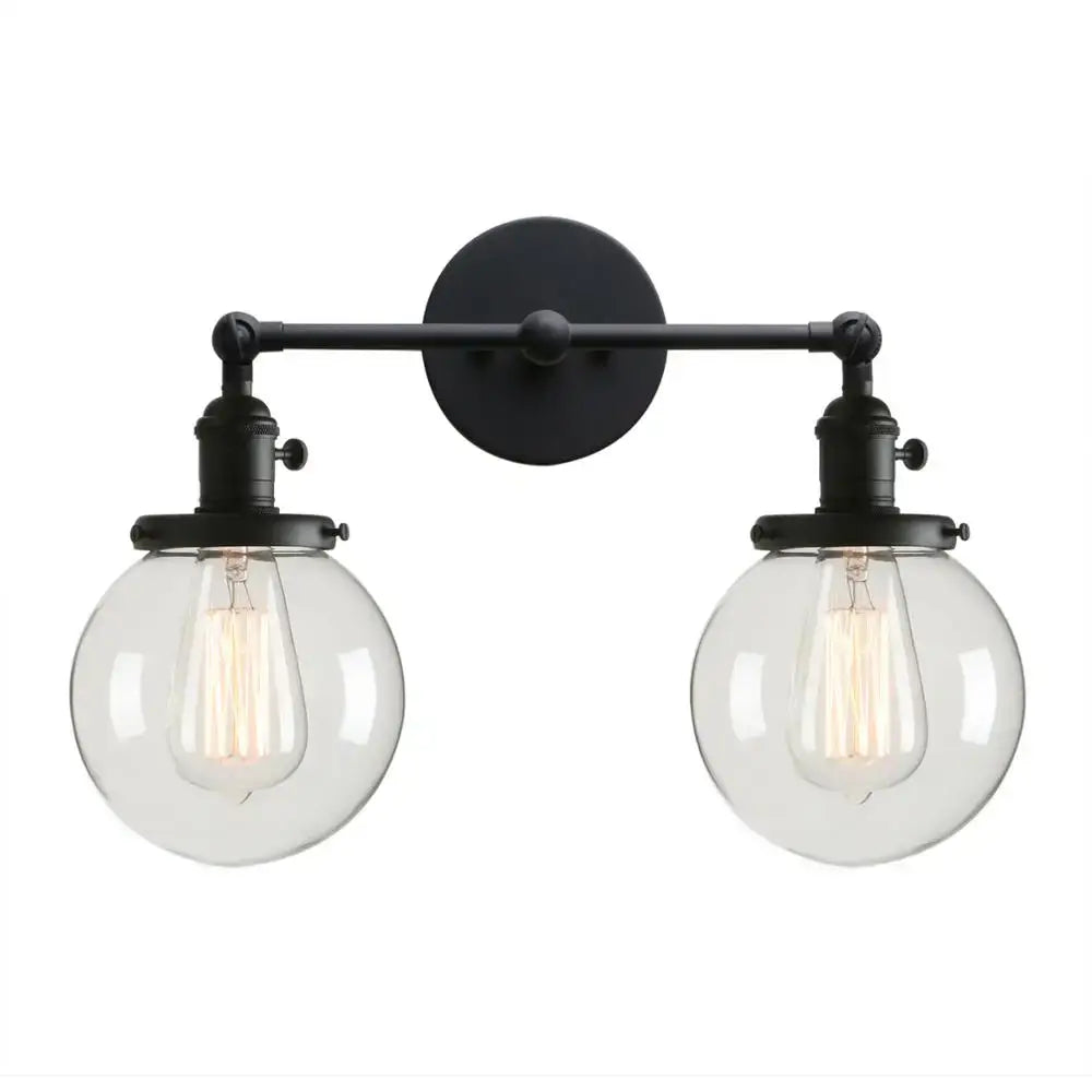 Black wrought iron modern double ball heads globe glass wall sconce with two clear globe shades for bedroom lighting
