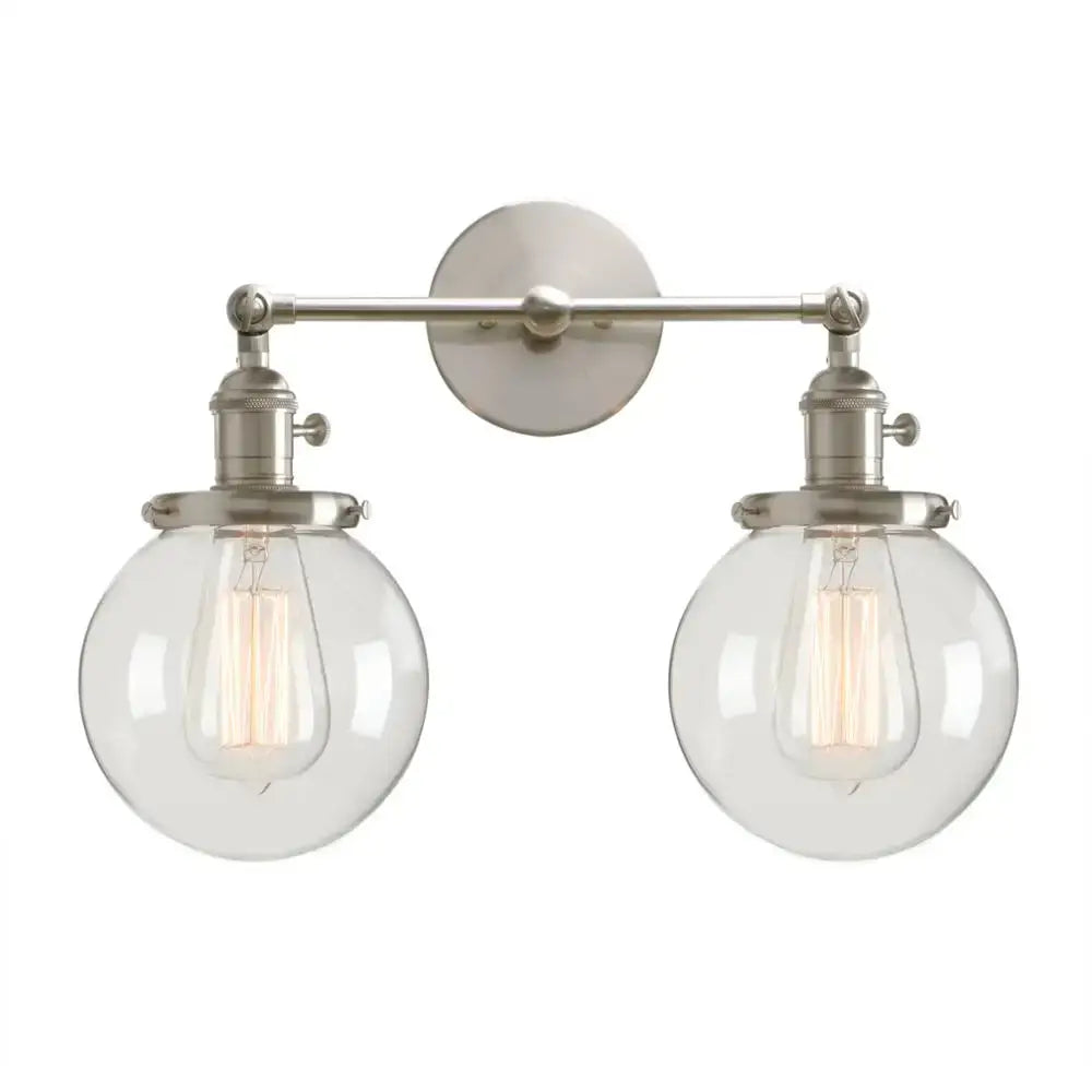Brushed nickel double ball heads globe glass wall sconce with clear spherical shades and exposed filament bulbs for bedroom lighting