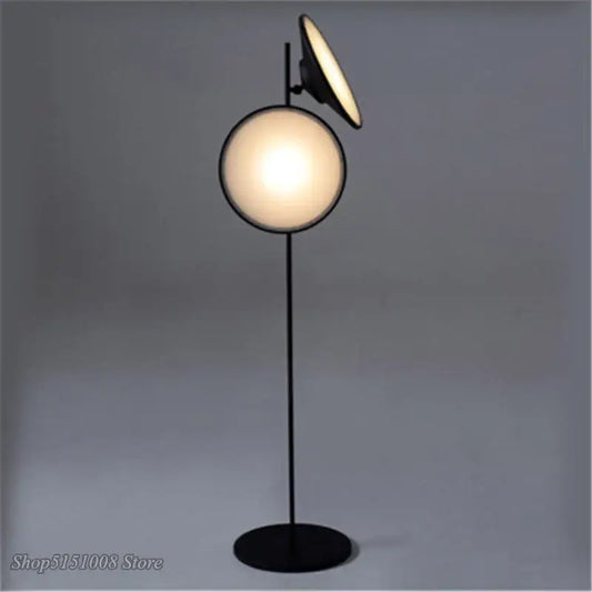 Modern black double horn radar floor lamp with spherical frosted glass globe and adjustable spotlight for living room decorbites double horn