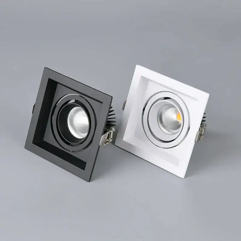 Modern black double ring led recessed ceiling light with square white spots and metallic accents for living room use