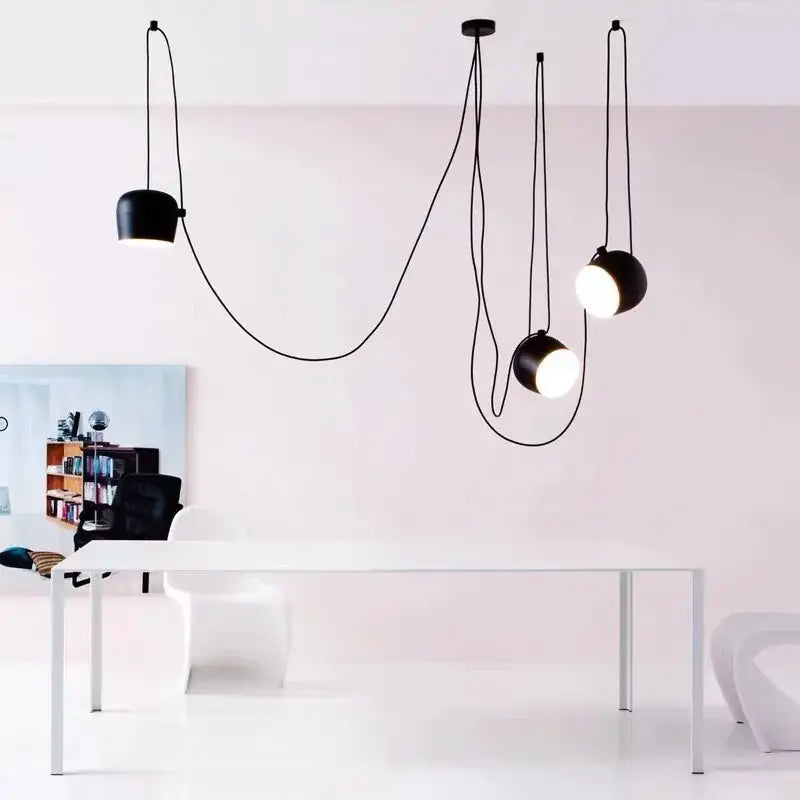Modern black drum led pendant kitchen ceiling light with black spherical drum led lights and exposed cords decorbites black drum