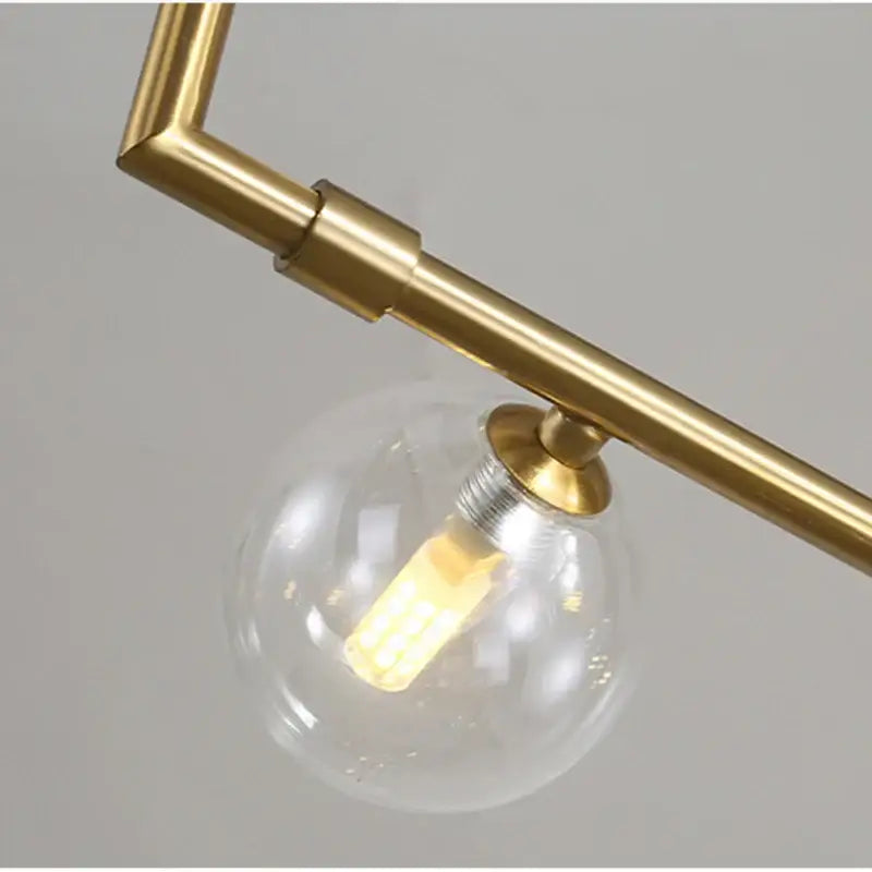 Modern black dual glass lamp ceiling chandelier with warm glowing led bulb on brass-finished metal arm decorbites dual glass