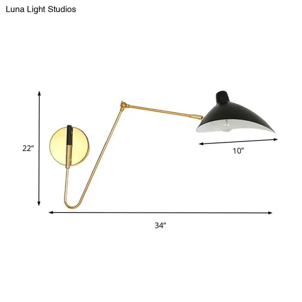 Modern black wall lamp with a white duckbill shade and gold-toned curved arm bedroom sconce