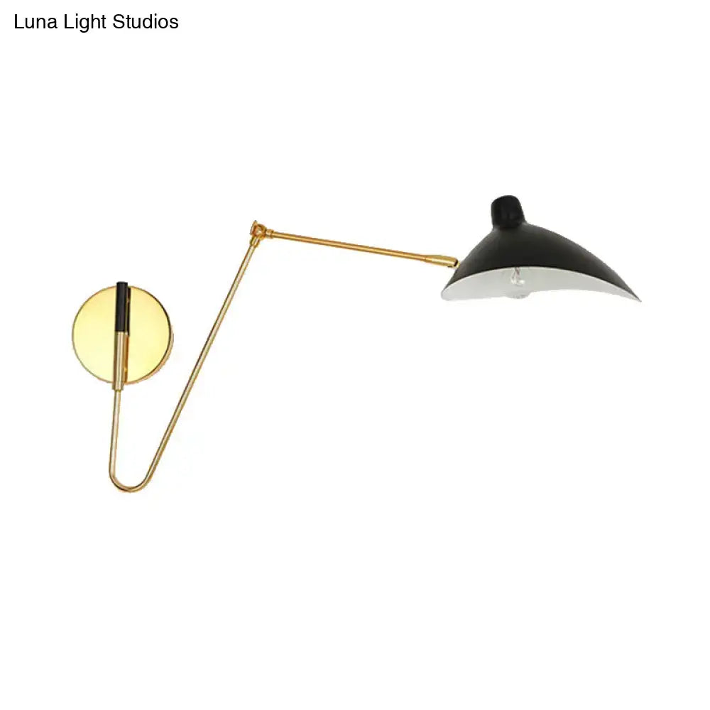Modern black and gold wall lamp with duckbill shade and curved arm for adjustable bedroom sconce lighting