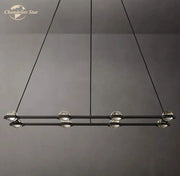 Modern black éclatant crystal chandelier with clear glass globe bulbs suspended by thin cords for living room use