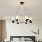Modern black metal nordic pendant chandelier with eight frosted glass globes for living room lighting