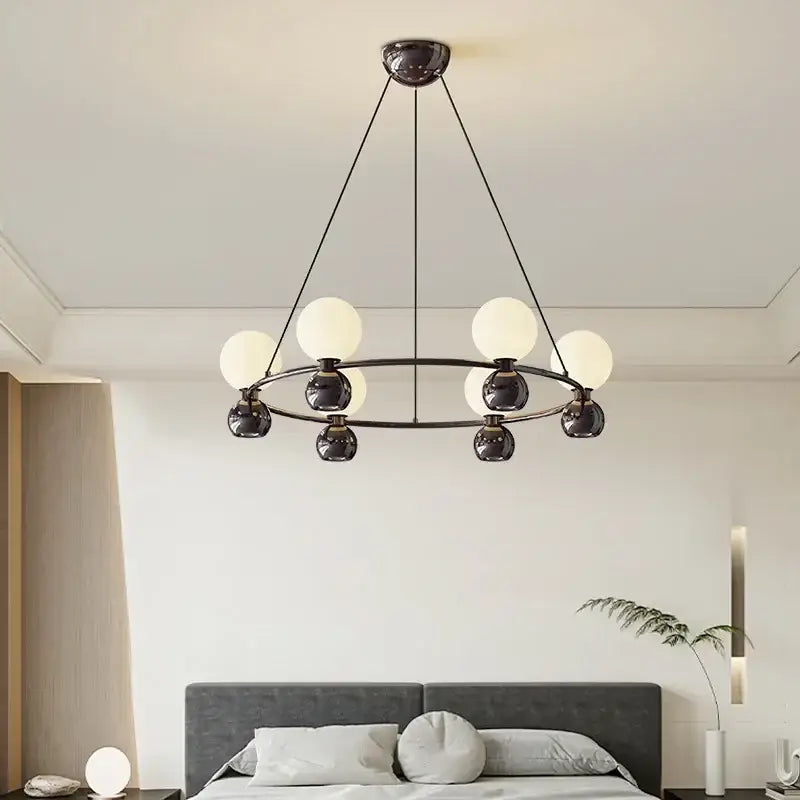 Modern black metal nordic pendant chandelier with eight frosted glass globes for living room lighting