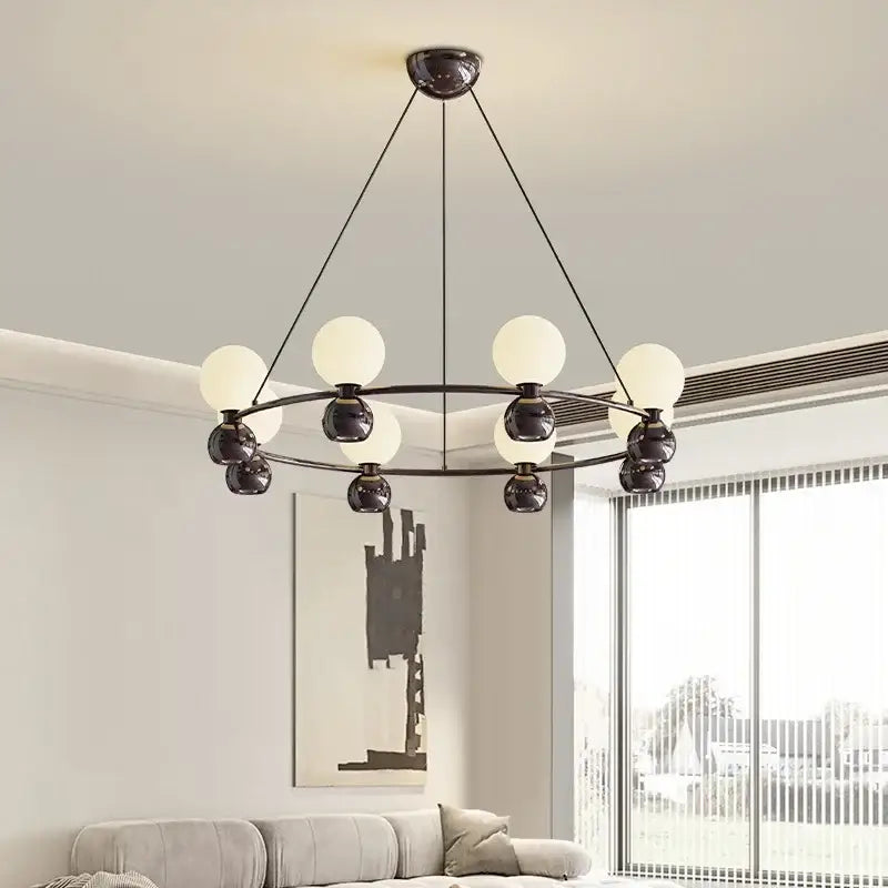 Modern black metal nordic pendant chandelier with eight frosted white spherical glass globes for living room