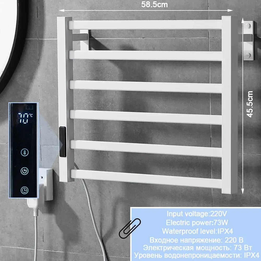Modern white electric towel warmer with digital temperature display and control panel for bathroom use