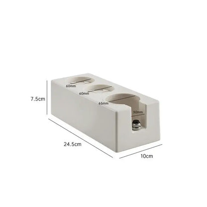 White rectangular ceramic wall-mounted outlet holder with three circular cutouts for modern black espresso tamper station decorbites espresso tamper