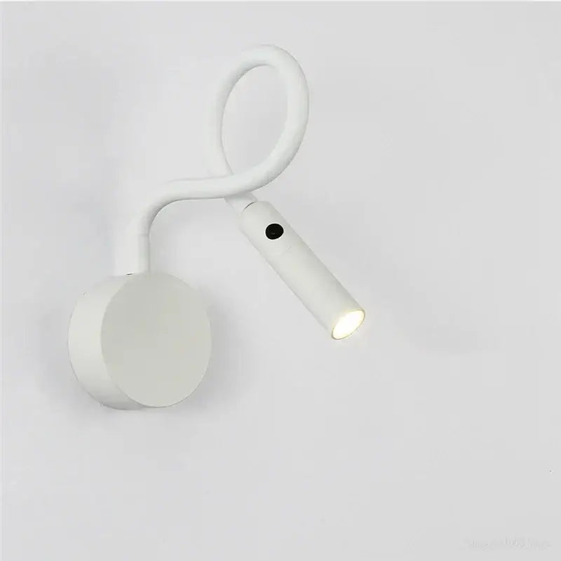 White adjustable wall-mounted reading lamp with sleek curved design and illuminated head for decorbites led wall sconces