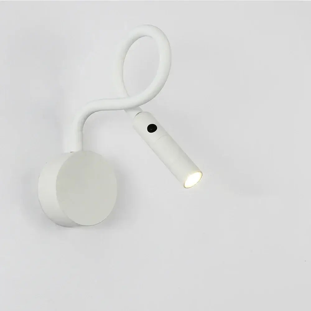 White adjustable led wall sconce with sleek curved design and illuminated head for bedroom decorbites led wall lighting