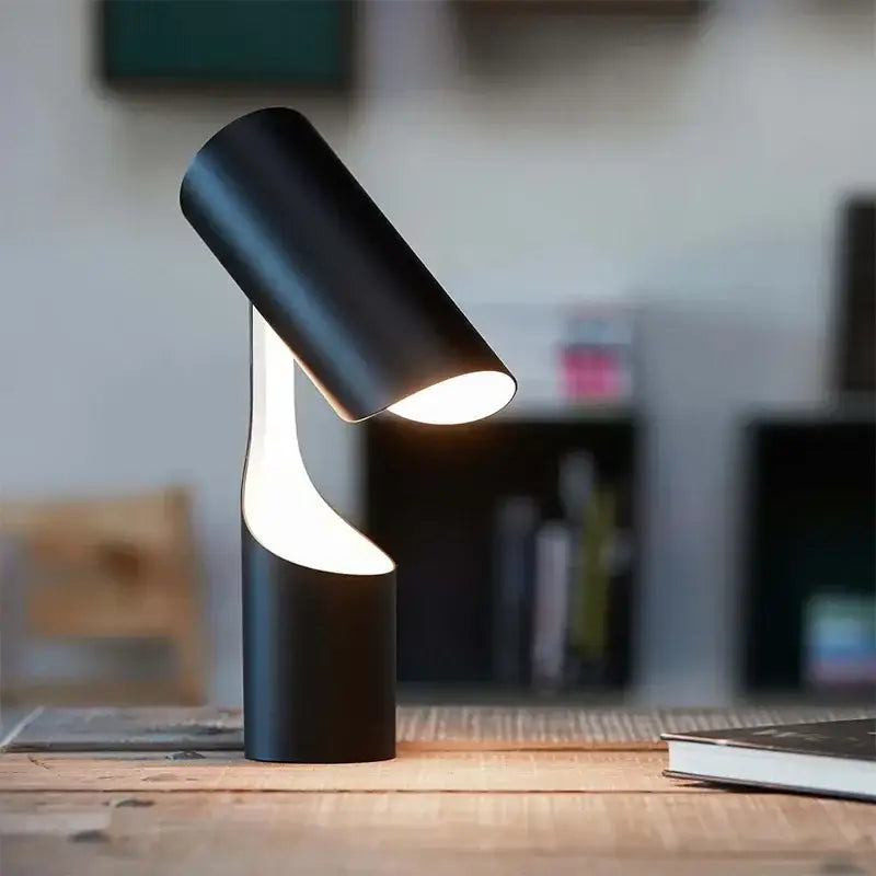Modern black foldable desk lamp with sleek cylindrical design and warm light ideal for study and bedroom decorbites black foldable