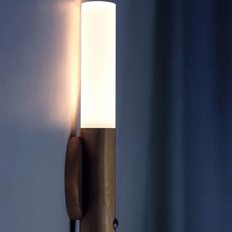 Modern black night light wall sconce with frosted glass diffuser and natural wood base by decorbites bodysense led rechargeable