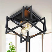 Modern black geometric ceiling chandelier with exposed filament bulbs for living room decorbites black modern style
