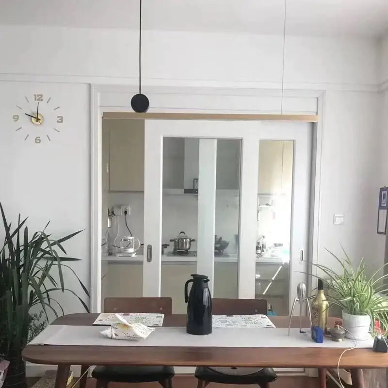 Black ceramic thermal carafe with glossy finish and sleek modern design complementing decorbites geometric copper pendant lights
