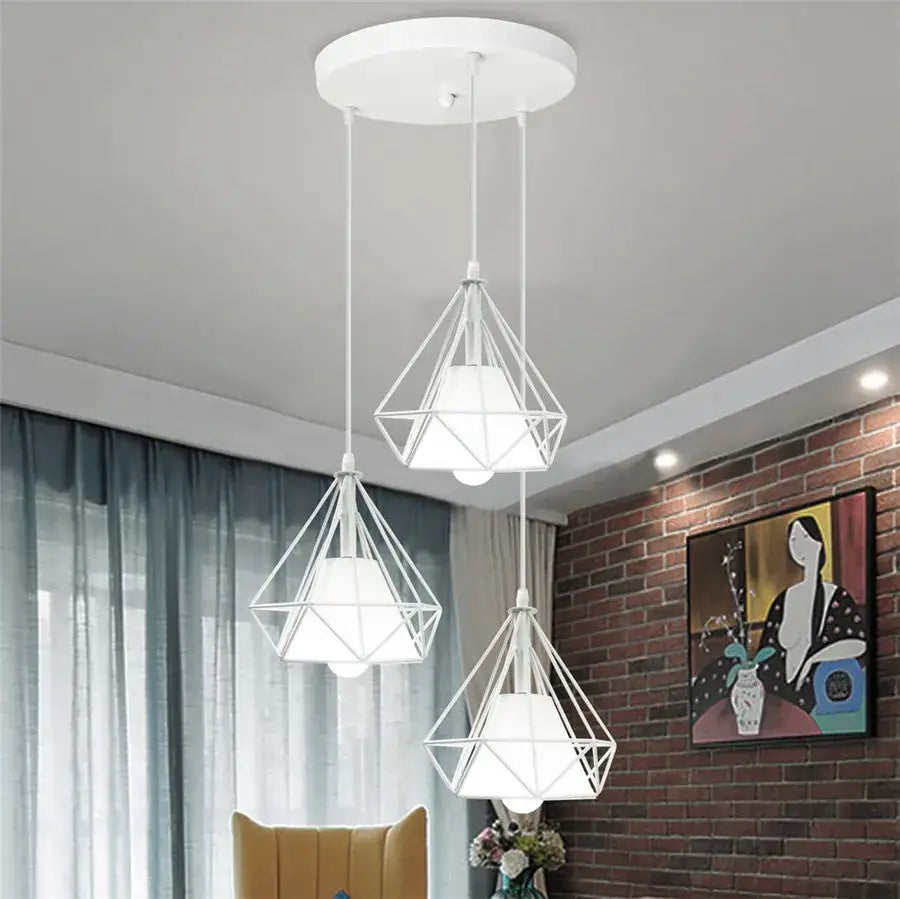 Modern black geometric diamond pendant lights trio with white wireframe and frosted glass shades for kitchen lighting