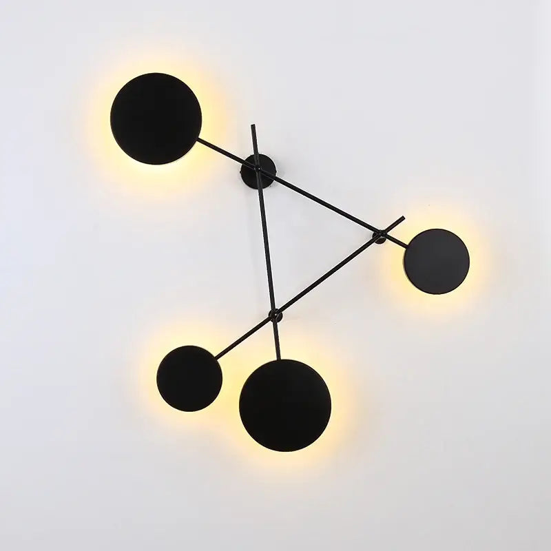 Modern black geometric iron wall lamp with glowing circular light fixtures for living room decorbites geometric iron wall sconce