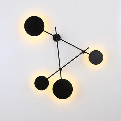 Modern black geometric iron wall lamp with glowing circular light fixtures for living room decorbites geometric iron wall