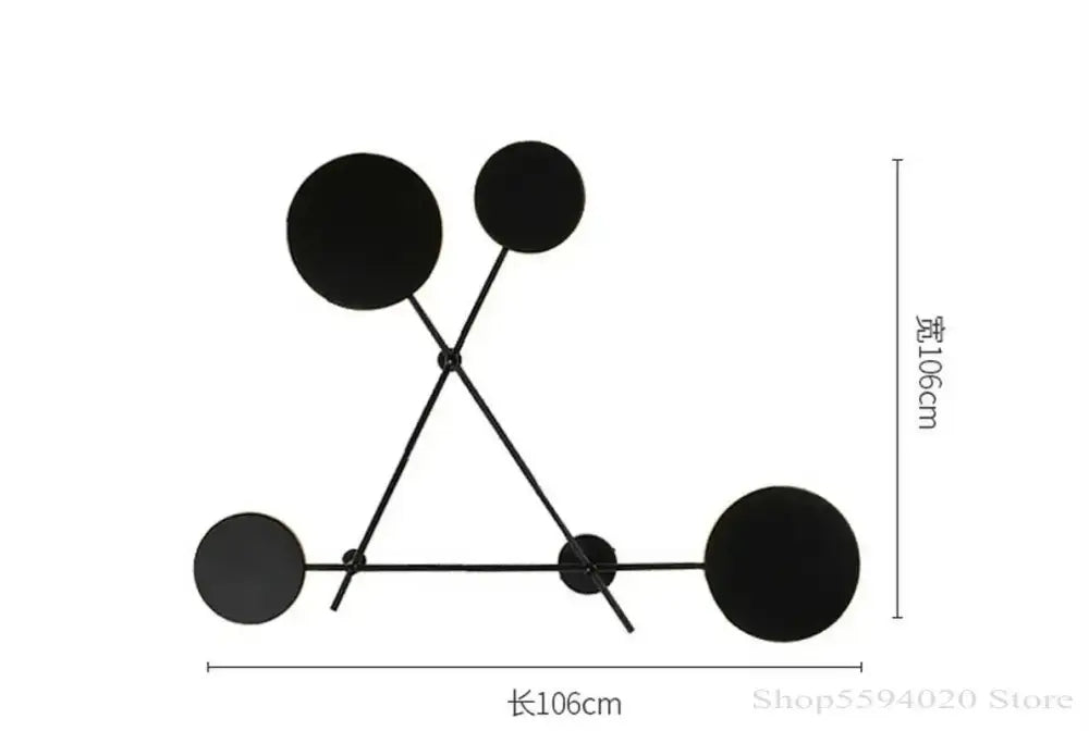 Modern black geometric iron wall lamp with interconnected circular discs and rods for living room decorbites geometric iron wall decor