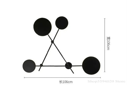 Modern black geometric iron wall lamp with interconnected circular discs and rods for living room decorbites geometric iron wall decor
