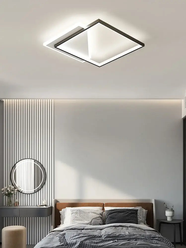 Modern black geometric led ceiling lamp featuring a sleek square frame and bright white panels for bedroom decorbites decor
