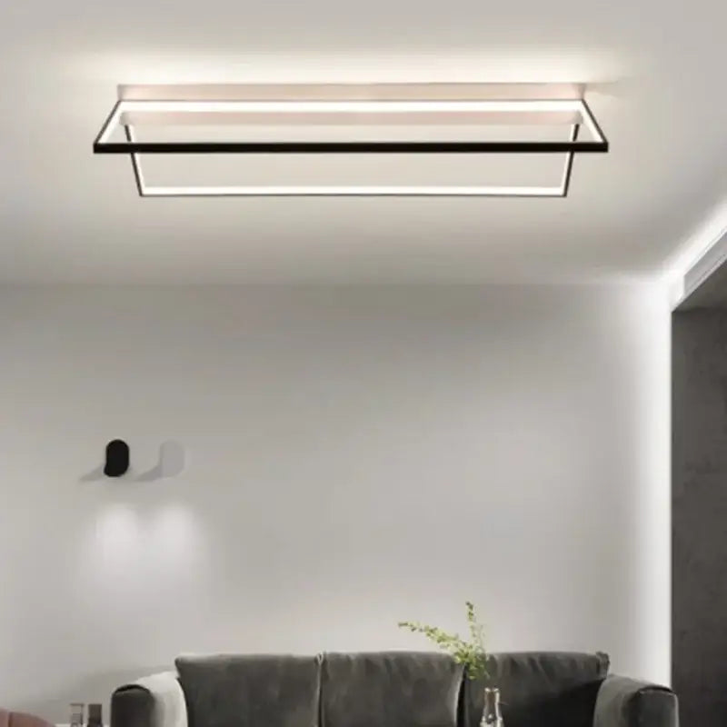 Modern black geometric led ceiling light with sleek frame and white led strip for living room illumination decorbites geometric led