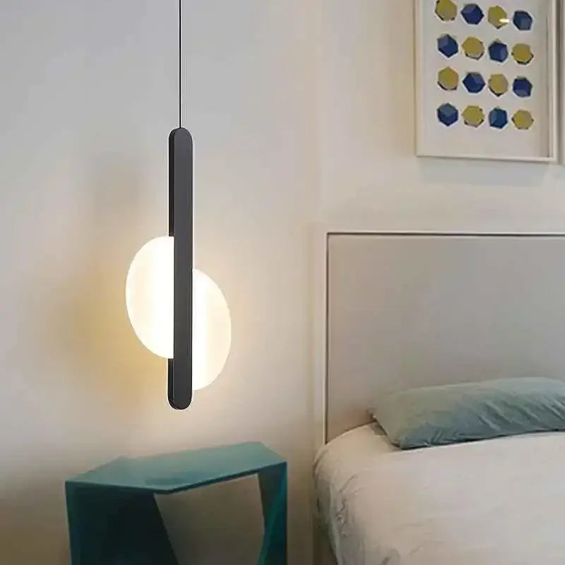 Modern black geometric led pendant light with sleek vertical bar and glowing circular lampshade for living room decorbites pendant lights