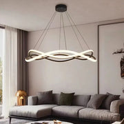 Modern black geometric led ring chandelier with sleek white and black illuminated bands for dining room decorbites black geometric lighting