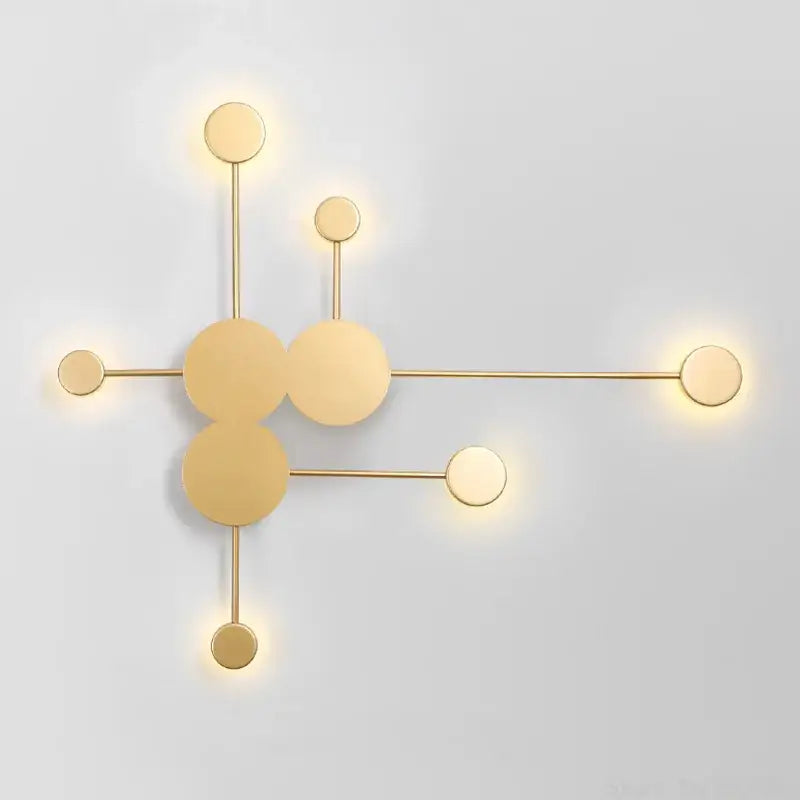 Modern black geometric led wall lamp with gold-toned circular design providing warm diffused light for living room decorbites geometric led wall lamp