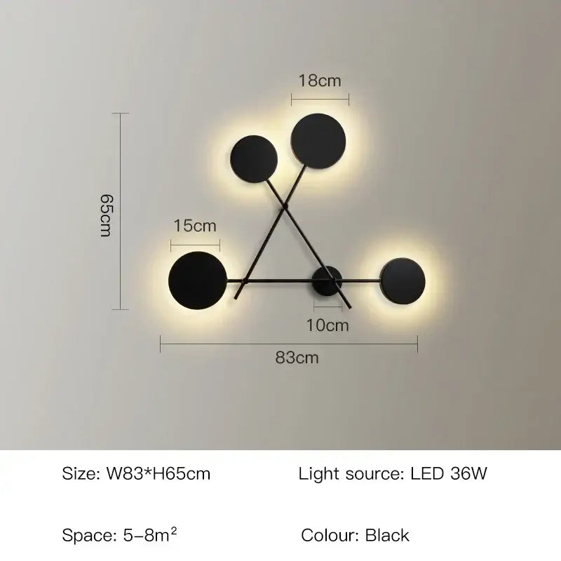 Modern black geometric led wall lamp with four circular bulbs is a sleek led wall light fixture for living rooms