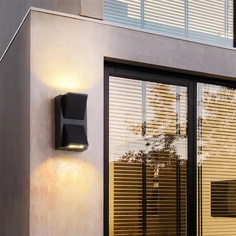 Modern black geometric led wall lamp with angular design for garden outdoor decorbites led wall sconce
