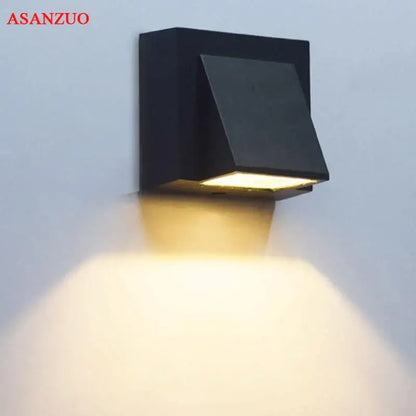 Modern black geometric led wall lamps with warm yellow illumination for outdoor decorbites led wall lighting
