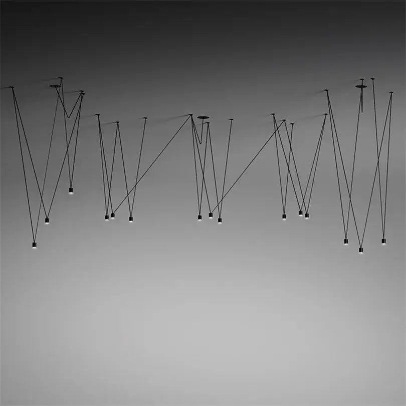 Modern black geometric led wire pendant light featuring multiple slender cords and small illuminated bulbs for office decorbites geometric led chandelier