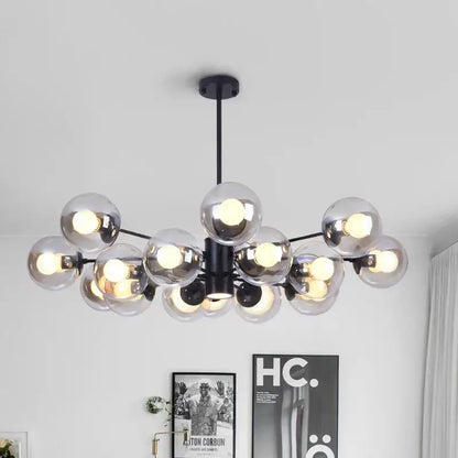 Modern black metal ball led chandelier with multiple clear glass globe bulbs for dining room decorbites glass ball lighting