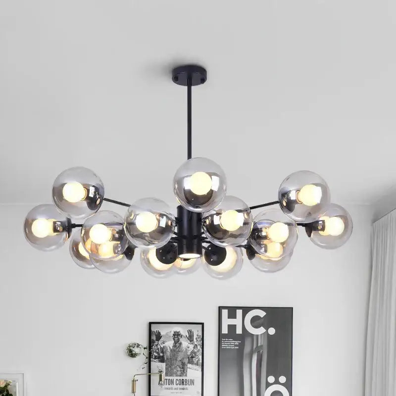 Modern black metal ball led chandelier with multiple clear glass globe bulbs for dining room decorbites glass ball lighting