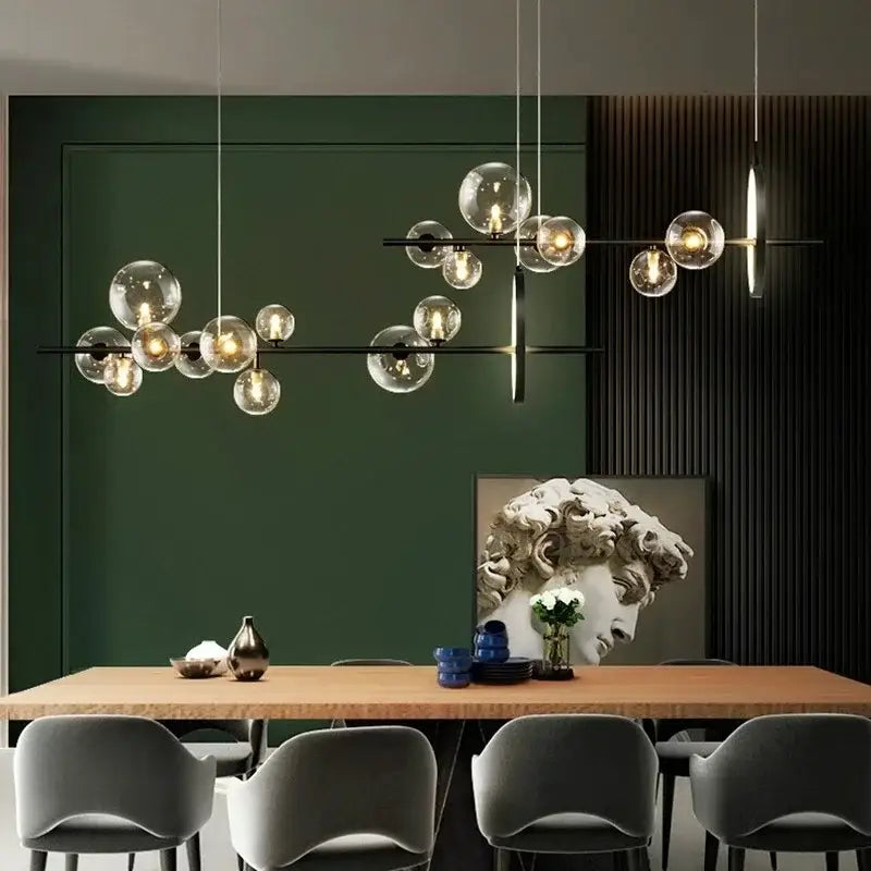 Modern black glass ball led chandelier with metal frames hanging above a dining table for dining room lighting