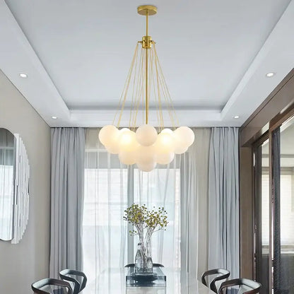 Modern black glass ball led chandelier with gold-toned frame and frosted glass globes for stylish living room decorbites glass ball
