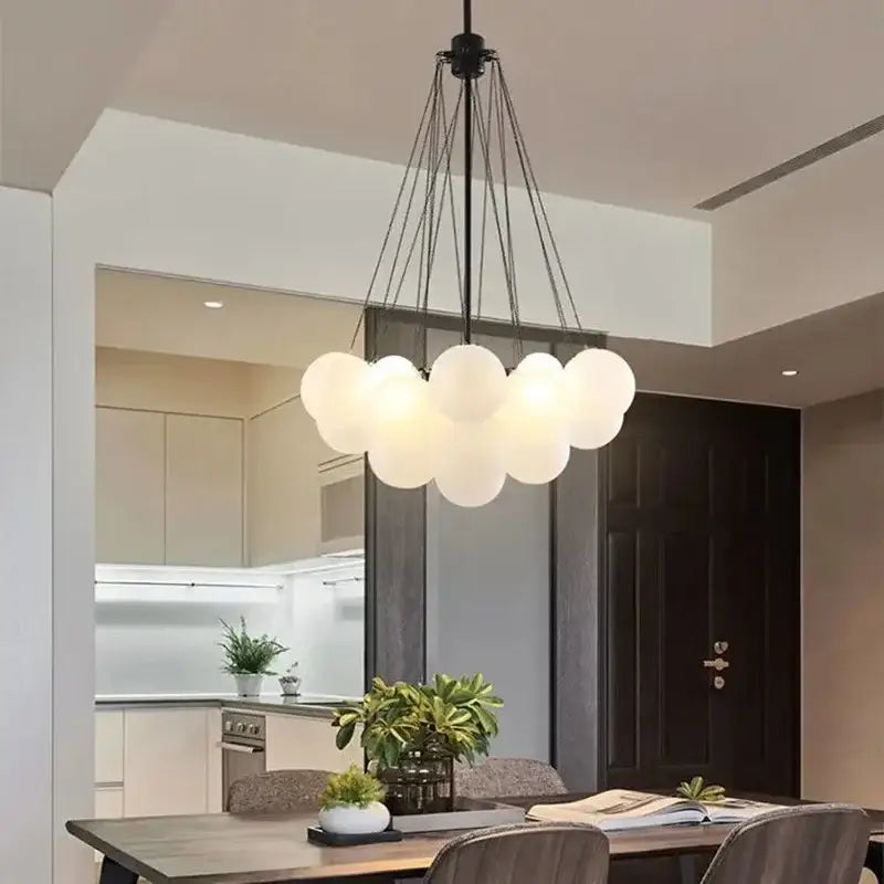 Modern black glass ball led chandelier featuring frosted glass globes and a metal frame for living room decorbites glass ball