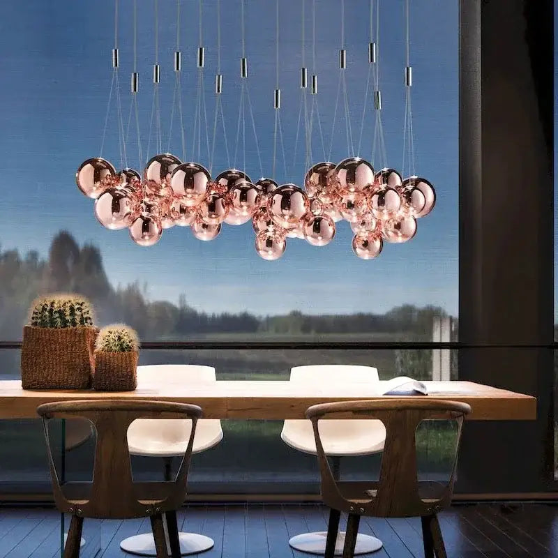 Modern black glass ball led pendant lamps with rose gold spherical fixture and reflective glass orbs for kitchen decorbites decor