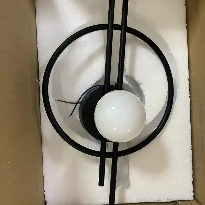 Modern black glass ball led wall lamp with circular frame and frosted white bulb for living room decorbites glass ball design