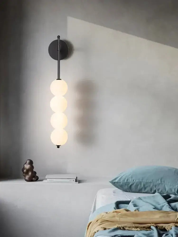 Modern black glass ball led wall sconce with four stacked frosted glass spheres for living room decorbites decor