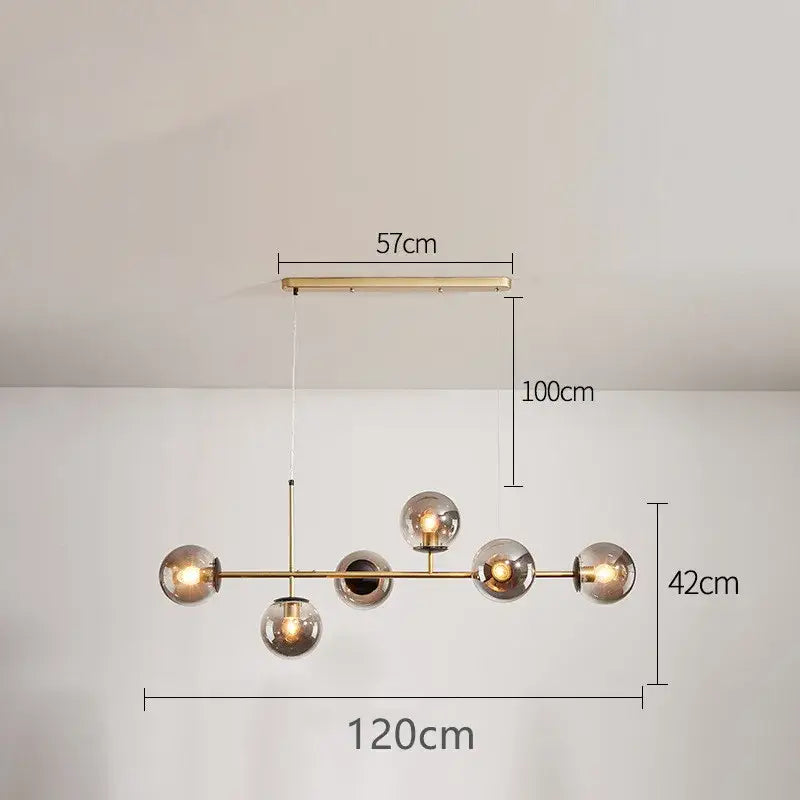 Modern black glass ball pendant lamps featuring a brass chandelier with five smoked glass globe bulbs in linear design decorbites glass ball